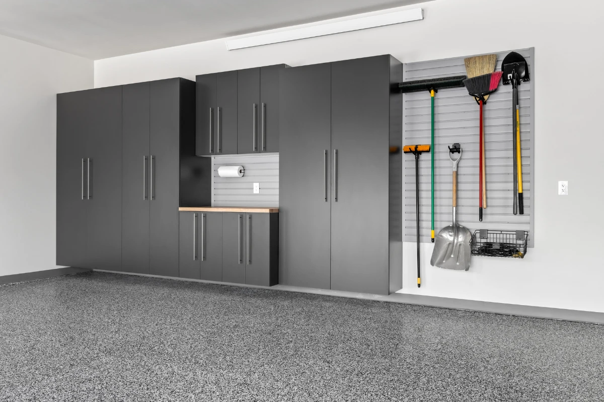 Garage Cabinets in Slate, Butcher Block Countertop, Gray Slatwall, Epoxy Floor