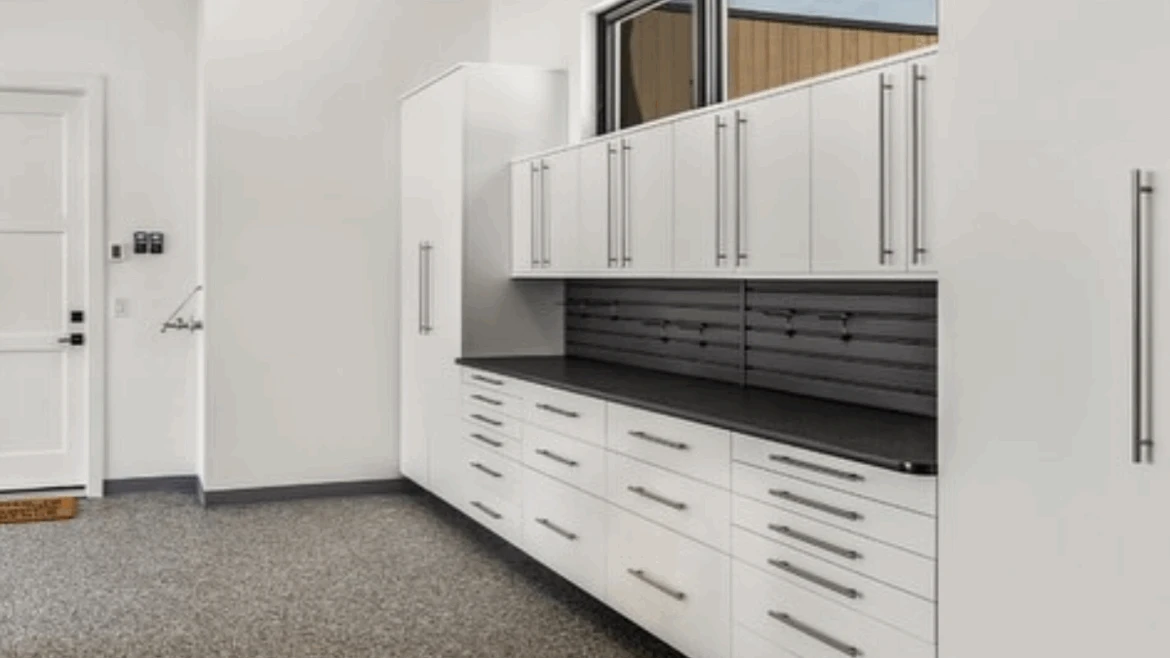 White Garage Cabinets, Ebony Star Countertop, Graphite Slatwall, Epoxy Floor