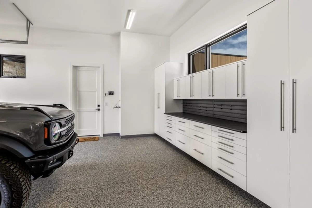 Garage Cabinets in Slate, Butcher Block Countertop, Gray Slatwall, Epoxy Floor