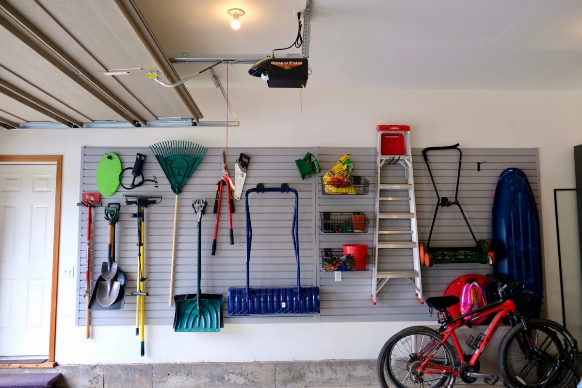 Storing garden tools, shovels & ladders on slatwall